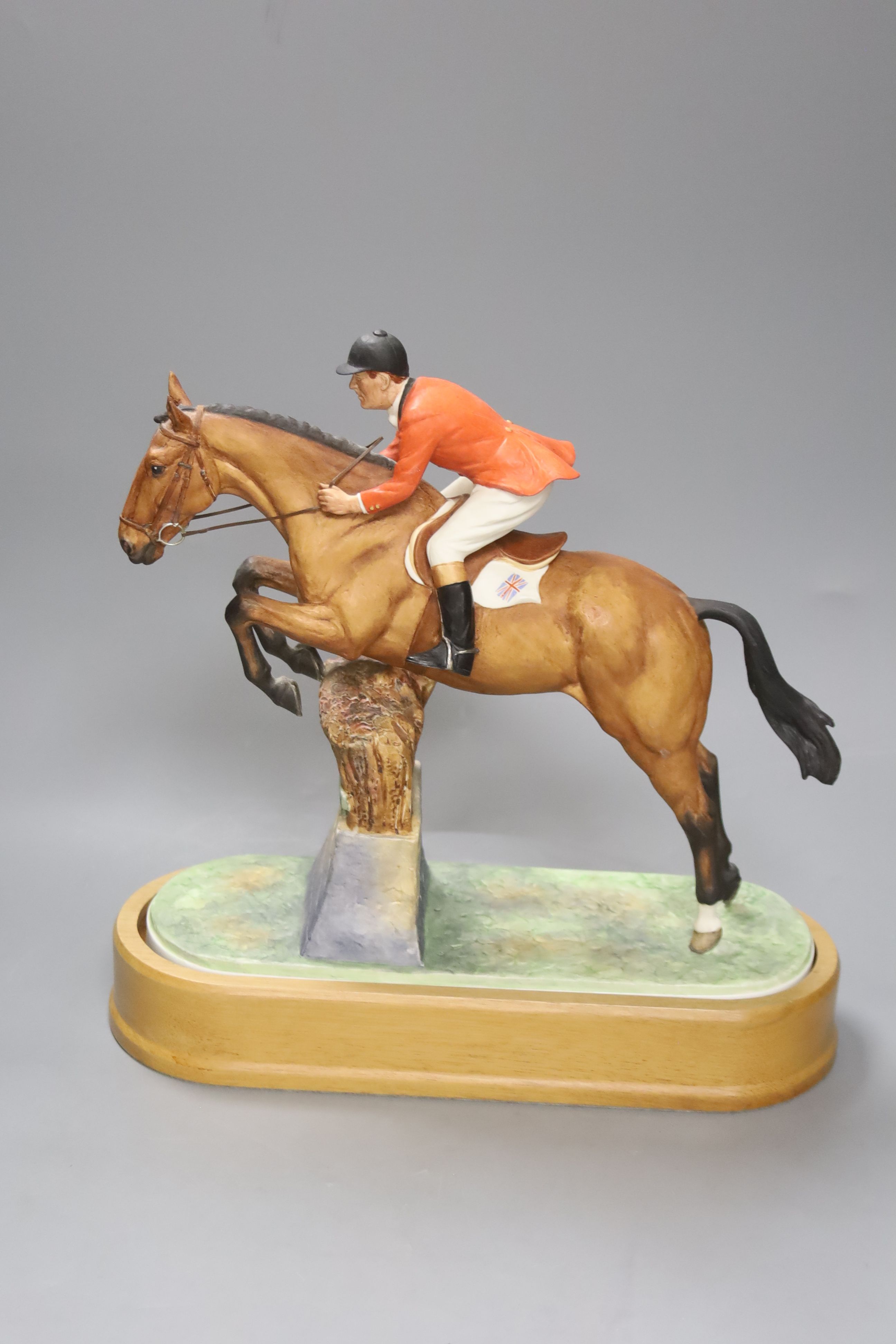 Doris Lindner for Royal Worcester, a limited edition figure, 'Foxhunter and Lt. Col. H M Llewellyn C.B.E.', no. 262/500, circa 1960, on wooden plinth, with certificate